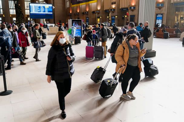 PHOTO: Holiday travels move through 30th Street Station in Philadelphia, on Dec. 21, 2022. (Matt Rourke/AP)