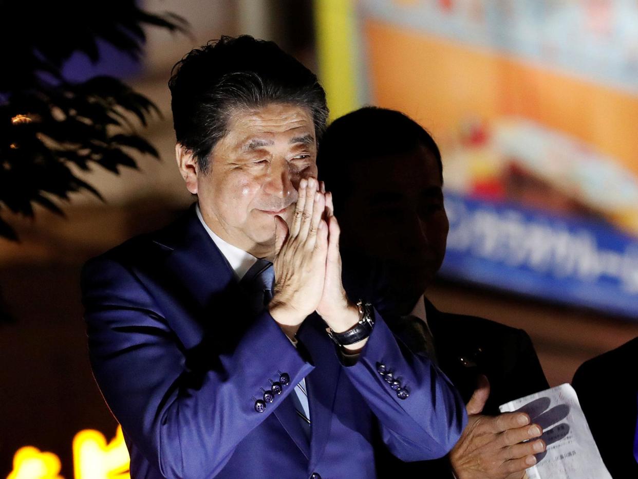 Japan's Prime Minister Shinzo Abe has led the Liberal Democratic Party to election victory: Reuters