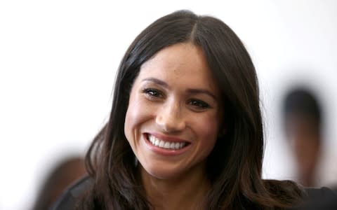 Brides giving speeches like Meghan Markle is expected to should remember to smile while delivering their address - Credit: Yui Mok/Pool via Reuters