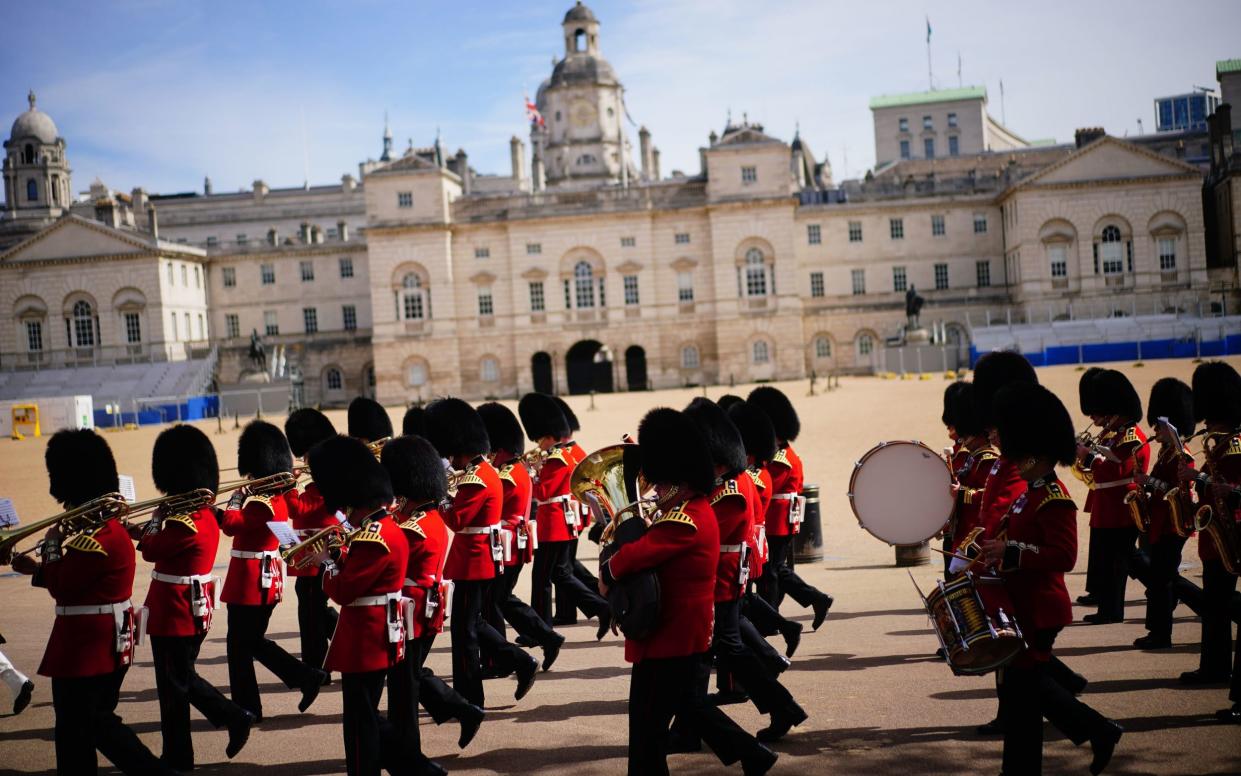 The band parades at The Guards Memorial in Westminster on Sunday
