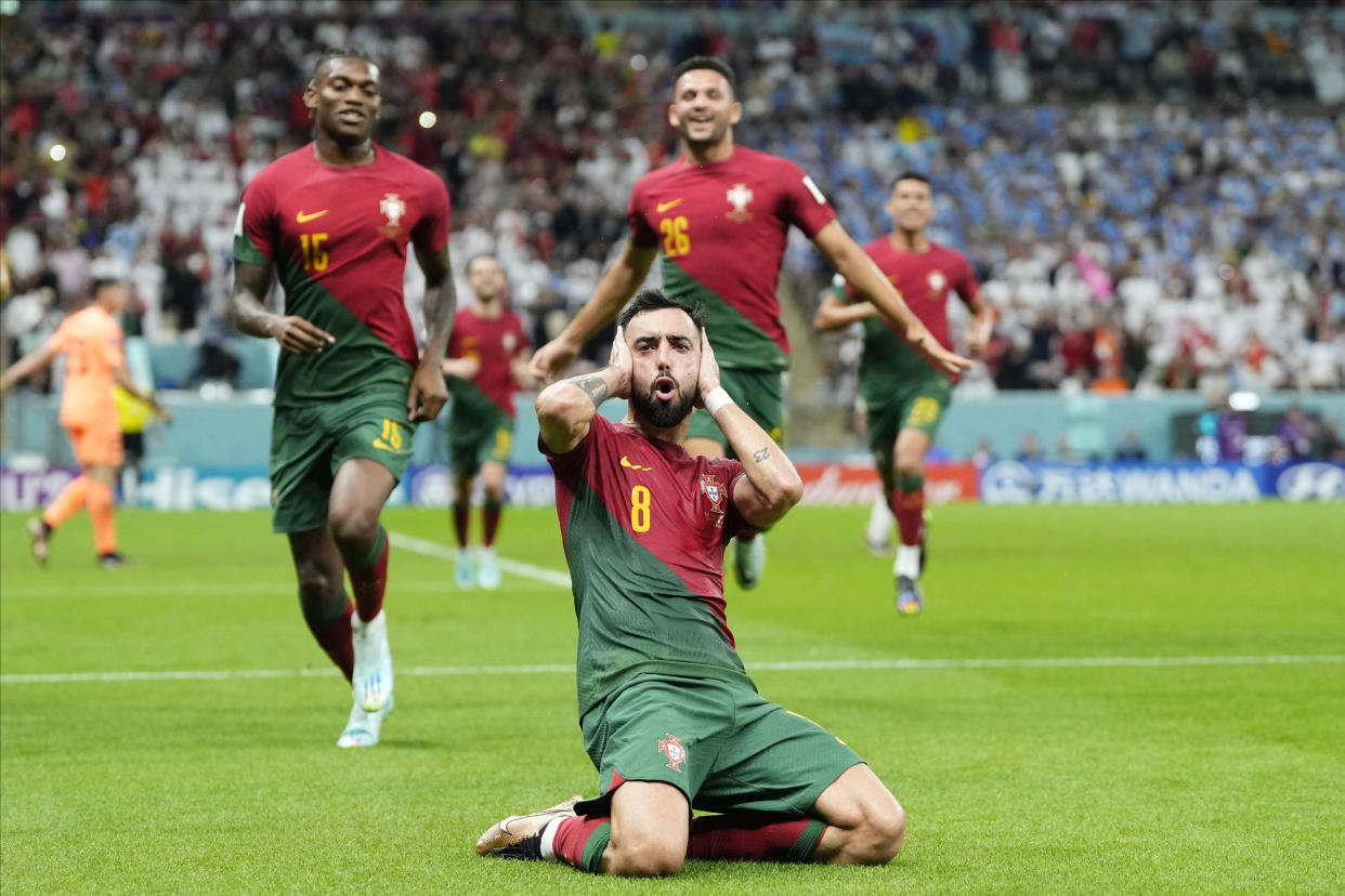 Bruno Fernandes attacking midfield of Portugal and Manchester United celebrates after scoring his sides second goal during the FIFA World Cup Qatar 2022 Group H match between Portugal and Uruguay at Lusail Stadium on November 28, 2022 in Lusail City, Qatar. (Photo by Jose Breton/Pics Action/NurPhoto via Getty Images)