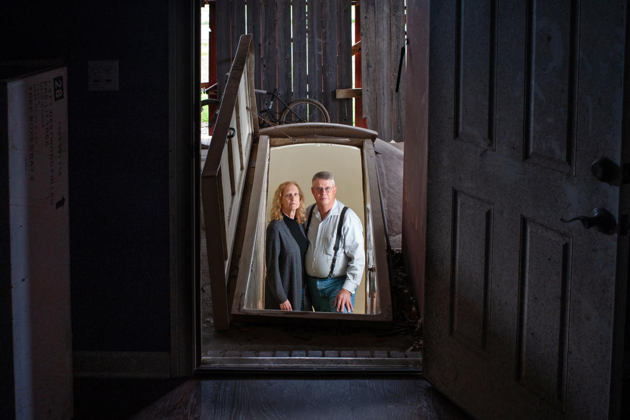 Sharon and Bill Newsom stand  inside a tornado shelter connected to their home in Rolling Fork, Miss. (Rory Doyle for NBC News)