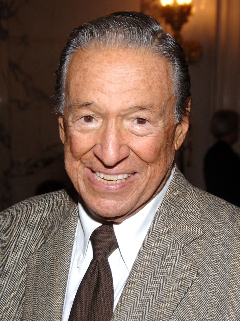 APRIL: Journalist and gameshow host, Mike Wallace, 93 (1918 – 2012). (Photo by Andrew H. Walker/Getty Images)