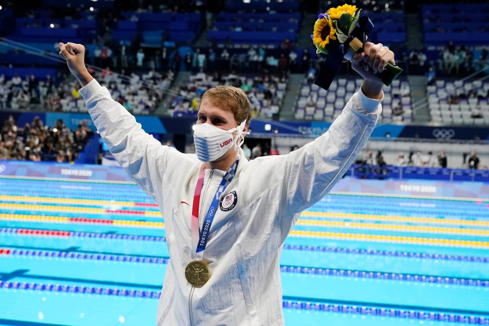 Chase Kalisz celebrates during the medals ceremony for the 400-meter individual medley at Tokyo Aquatics Centre.