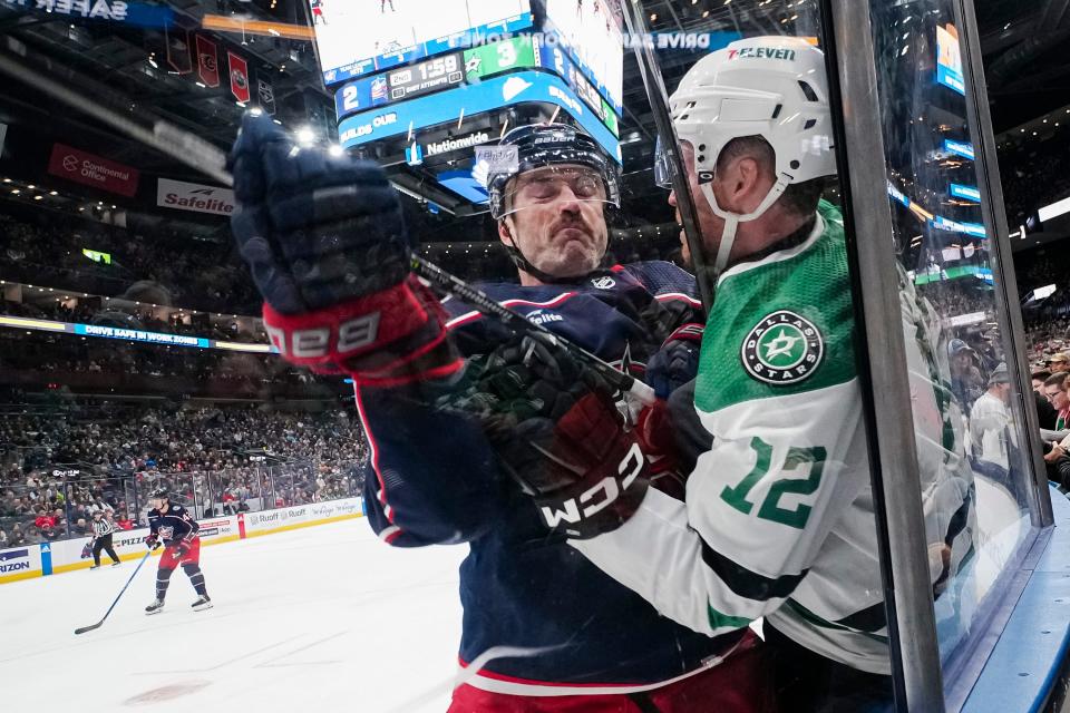 Nov 9, 2023; Columbus, Ohio, USA; Columbus Blue Jackets defenseman Erik Gudbranson (44) hits Dallas Stars center Radek Faksa (12) during the second period of the NHL hockey game at Nationwide Arena.