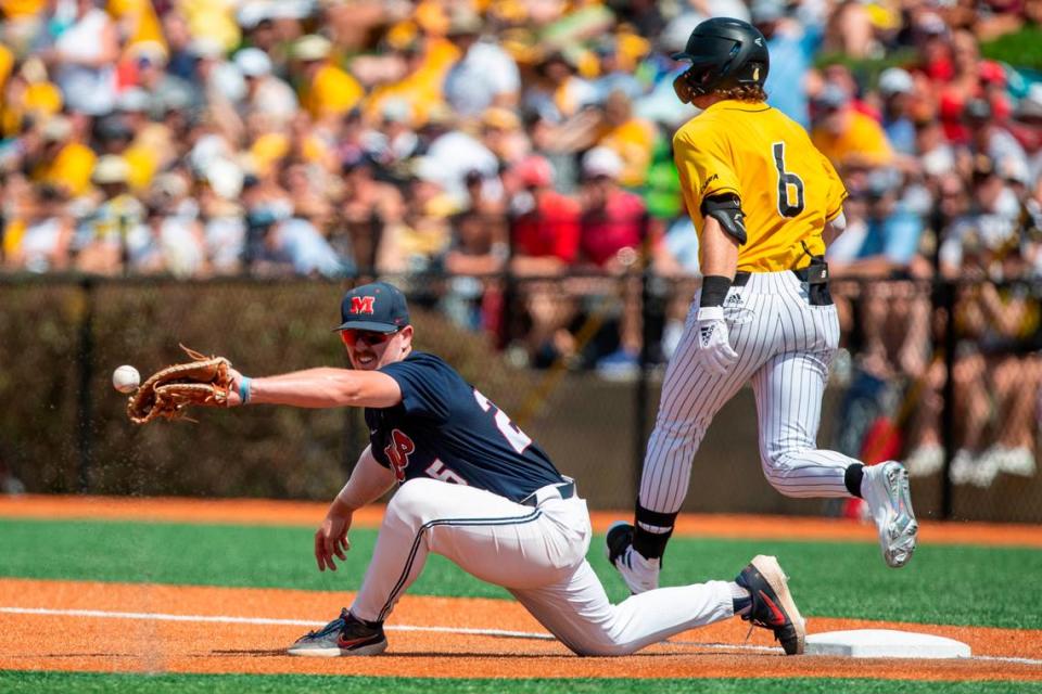 Ole Miss’s Tim Elko catches a ball at first base during the Super Regionals Final at Pete Taylor Park in Hattiesburg on Sunday, June 12, 2022.