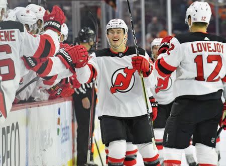 Nov 15, 2018; Philadelphia, PA, USA; New Jersey Devils right wing Joey Anderson (49) celebrates with teammates after scoring a goal against the Philadelphia Flyers during the first period at Wells Fargo Center. Eric Hartline-USA TODAY Sports