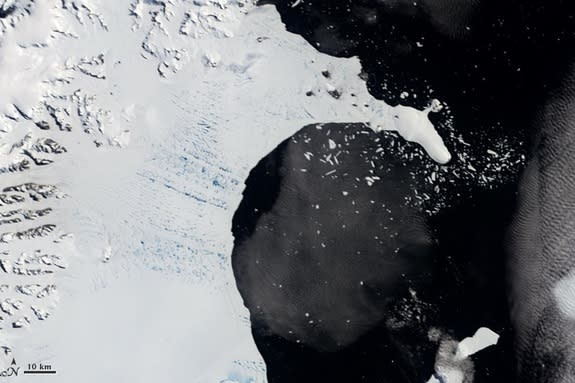 The Larsen B ice shelf on January 31, 2002. Melt ponds dot its surface. Scroll down for an after picture.