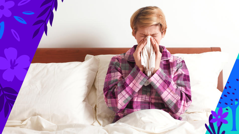 A woman sits up in bed with a handkerchief over her nose.