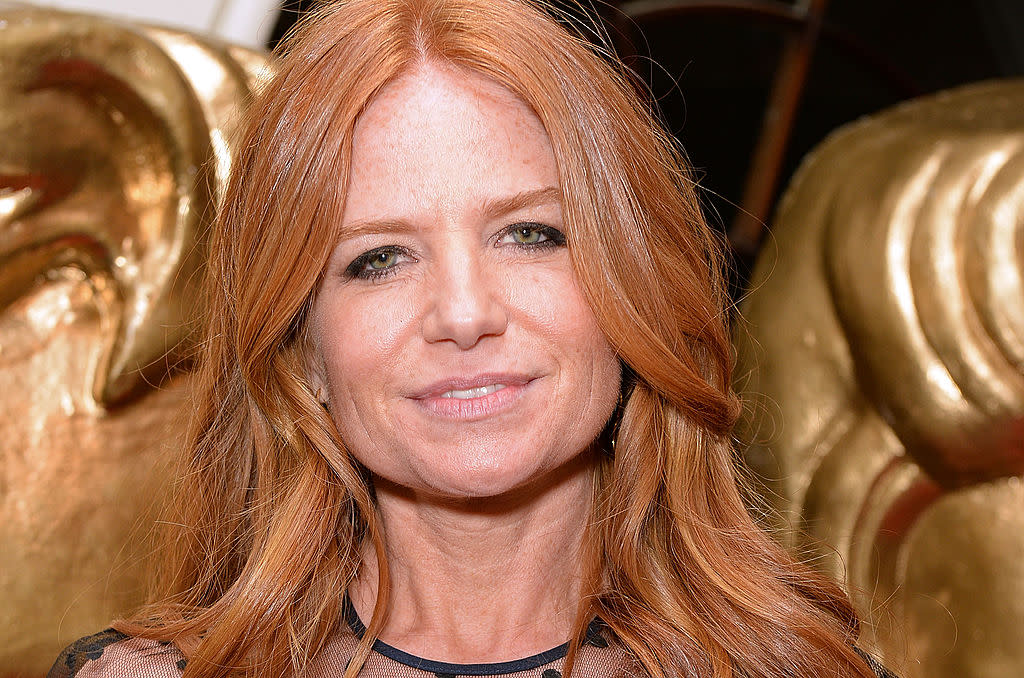 Patsy Palmer has revealed her red locks are turning grey and she's totally loving it, pictured here in 2014. (Getty Images)