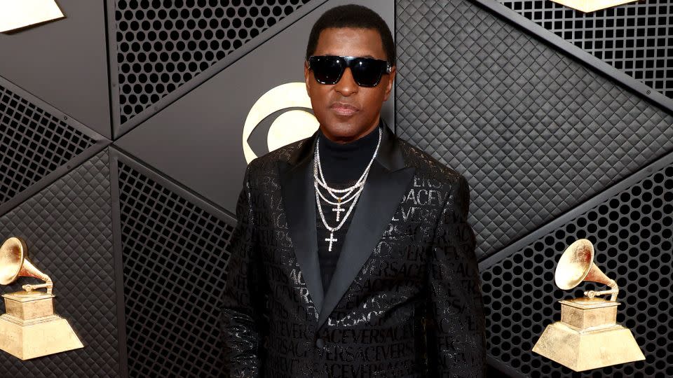 Triple nominee Babyface in an all-black Versace outfit. - Matt Winkelmeyer/Getty Images