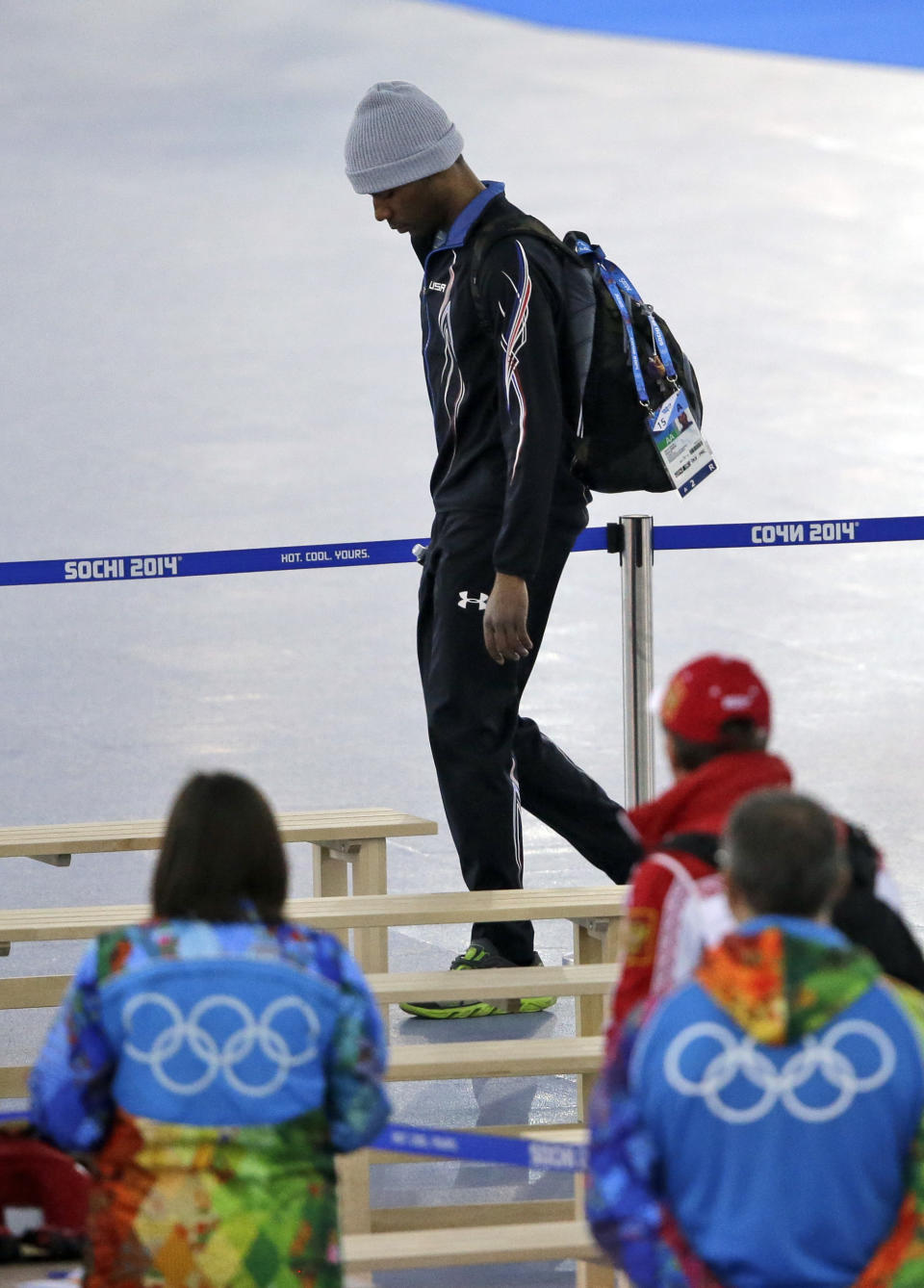 Shani Davis of the U.S. leaves the arena after the men's 1,500-meter speedskating race at the Adler Arena Skating Center during the 2014 Winter Olympics in in Sochi, Russia, Saturday, Feb. 15, 2014. (AP Photo/David Goldman)