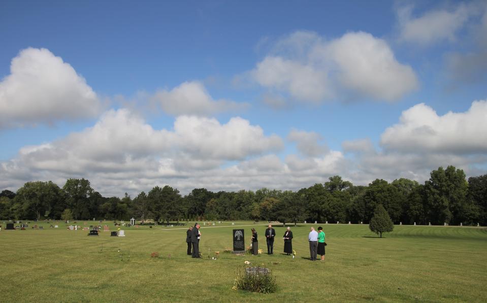 People pray during the National Day of Remembrance for Aborted Children on Sept. 9, 2023, at the St. Joseph Cemetery in Lansing.