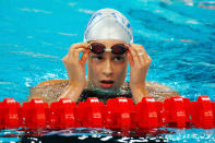 Federica Pellegrini of Italy celebrates finishing the Women's 200m Freestyle Heat 6 in first place held at the National Aquatics Center on Day 3 of the Beijing 2008 Olympic Games on August 11, 2008 in Beijing, China. Federica Pellegrini of Italy finished the race in a time of 1.55.45 a new World Record. (Photo by Cameron Spencer/Getty Images)