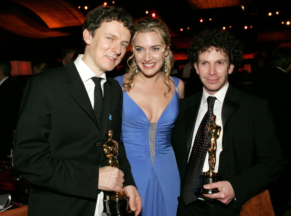 Michel Gondry, Kate Winslet and Charlie Kaufman after the 2005 Oscars, where Gondry and Kaufman won Best Original Screenplay for "Eternal Sunshine of the Spotless Mind." (Photo: Lucy Nicholson / Reuters)