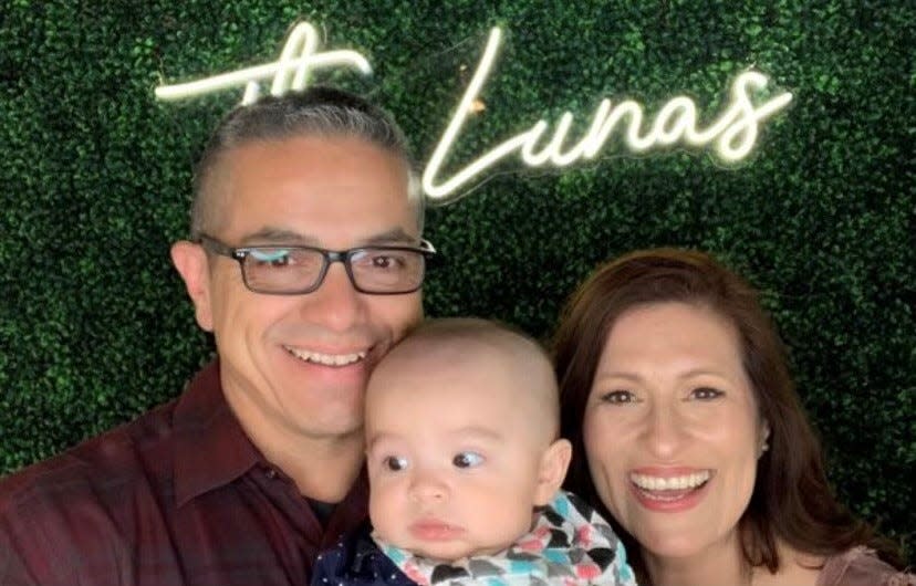 Lieutenant Mike Hernandez of the San Angelo Police Department with his wife of 36 years, Elisa, and grandson.