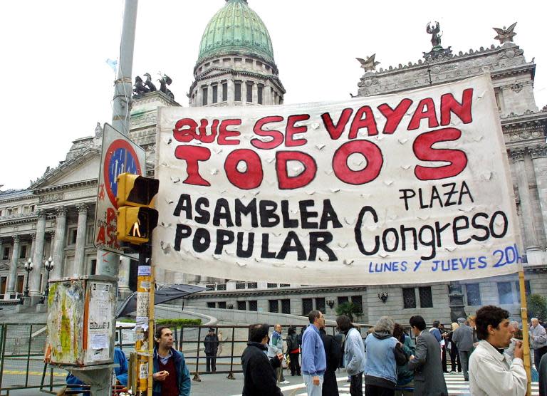 Argentinians gather in Buenos Aires, on April 23, 2002, to protest against a legislative proposal to issue bonds in order to avoid a financial collapse