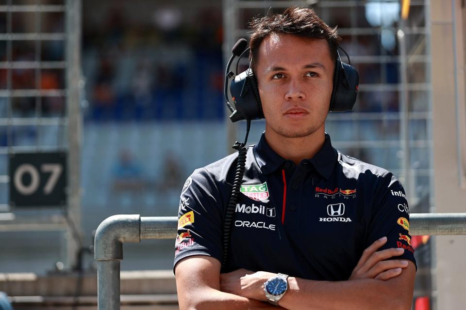 SPIELBERG, AUSTRIA - JULY 03: Alexander Albon of Thailand and Red Bull Racing looks on from the pitwall during final practice ahead of the F1 Grand Prix of Austria at Red Bull Ring on July 03, 2021 in Spielberg, Austria. (Photo by Mark Thompson/Getty Images)