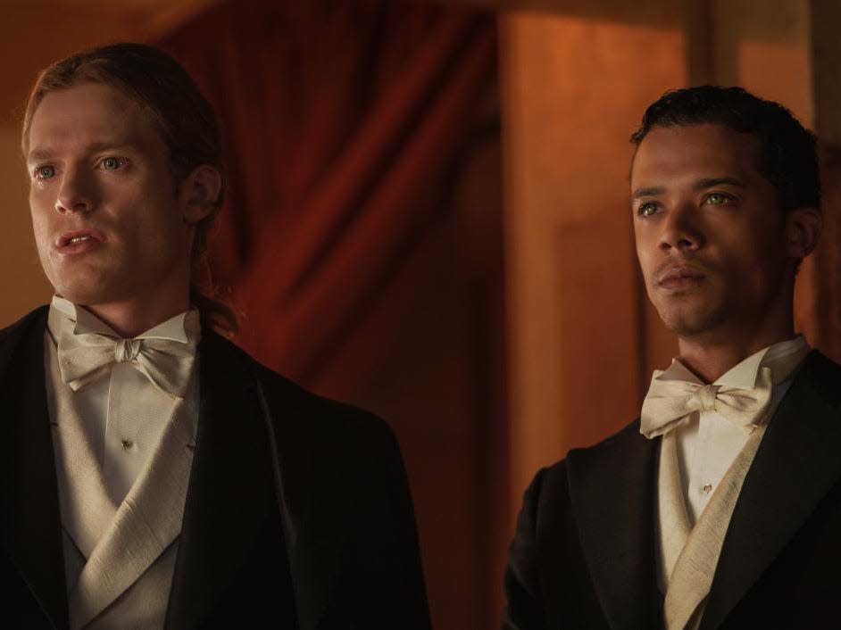 Sam Reid and Jacob Anderson dressed in formal attire in a scene from "Interview with the Vampire" on AMC.