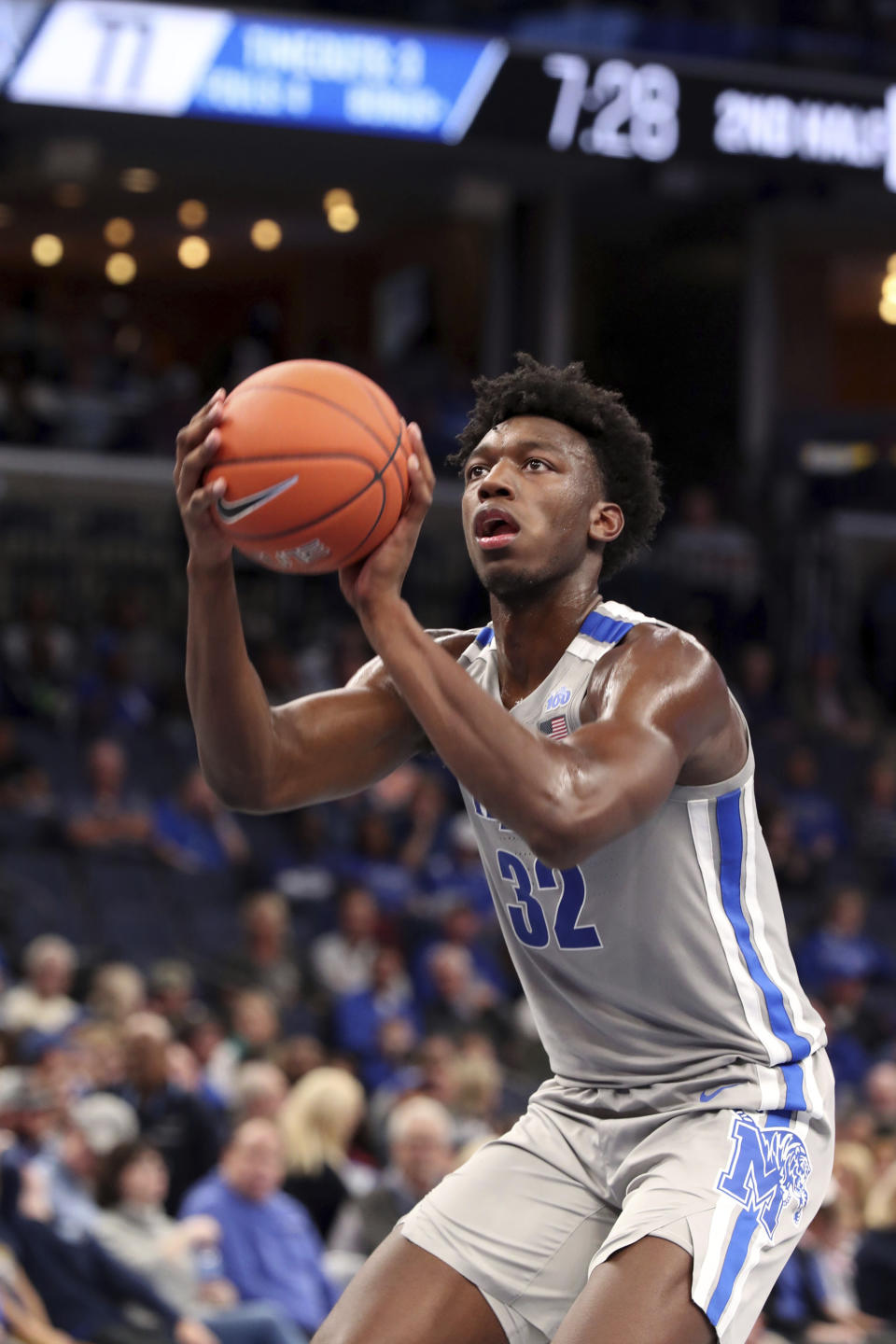 Memphis' James Wiseman (32) shoots a basket during the second half of an NCAA college basketball game against Illinois-Chicago, Friday, Nov. 8, 2019, in Memphis, Tenn. (AP Photo/Karen Pulfer Focht)