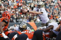 <p>New Orleans Saints quarterback Drew Brees (9) dives in for a touchdown in the first half of an NFL football game against the Cincinnati Bengals, Sunday, Nov. 11, 2018, in Cincinnati. (AP Photo/Frank Victores) </p>