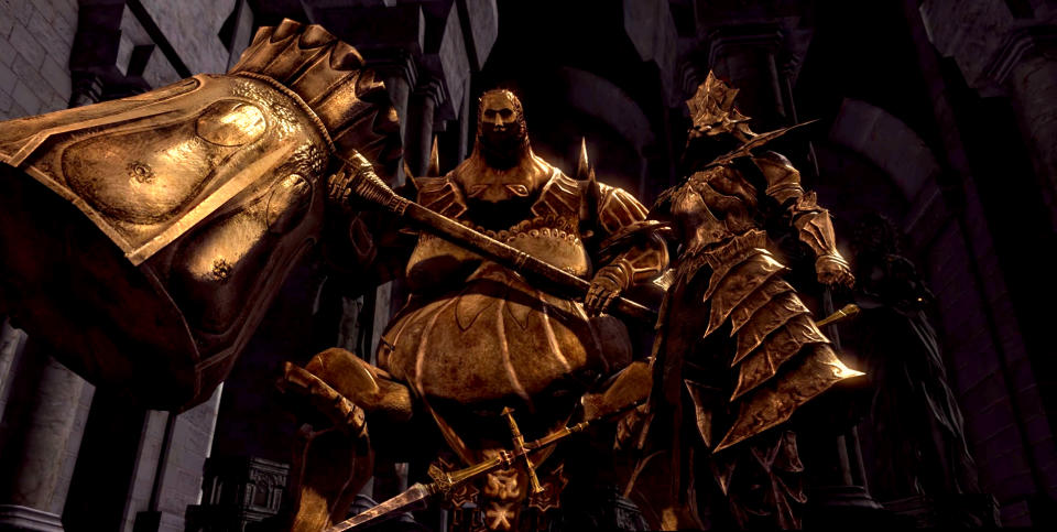 Dark Souls - Ornstein & Smough bosses in their golden armor and holding weapons in a cutscene defore their boss fight.