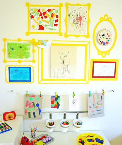 Childhood 101 For a low-commitment gallery wall of your kid’s artwork, place some temporary decal frames on a blank wall—or create “frames” from washi tape. Hang the art with pins or tape.Photo and idea from <a href="http://childhood101.com/" data-component="link" data-source="inlineLink" data-type="externalLink" data-ordinal="1">Childhood 101</a>. See the how-to <a href="http://childhood101.com/2011/02/sharing-our-kids-art-space/" data-component="link" data-source="inlineLink" data-type="externalLink" data-ordinal="2">here</a>.