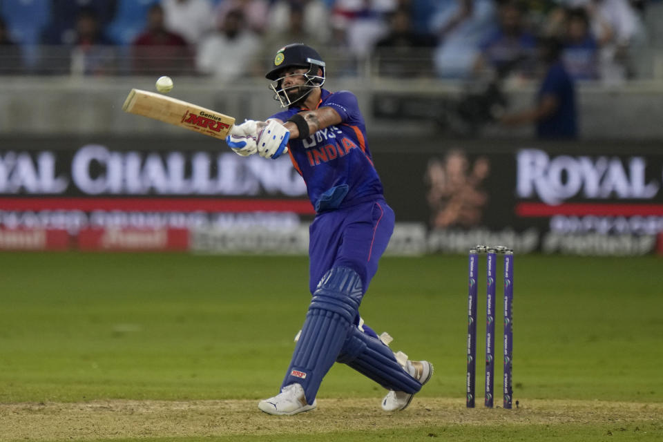 India's Virat Kohli plays a shot during the T20 cricket match of Asia Cup between India and Pakistan, in Dubai, United Arab Emirates, Sunday, Sept. 4, 2022. (AP Photo/Anjum Naveed)