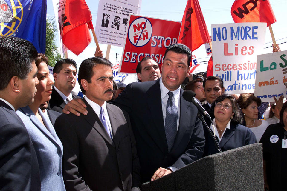 <div class="inline-image__caption"><p>Assemblyman Tony Cardenas (far left), Los Angeles City Council President Alex Padilla (center speaker), and State Senator Richard Alarcon (Padilla has his hand on his shoulder).</p></div> <div class="inline-image__credit">Anne Cusack/Los Angeles Times via Getty Images</div>