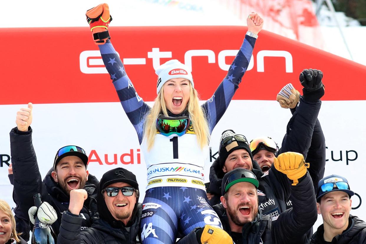 Mikaela Shiffrin celebrates with teammates after winning the Women's Giant Slalom event of the FIS Alpine Ski World Cup in Kranjska Gora