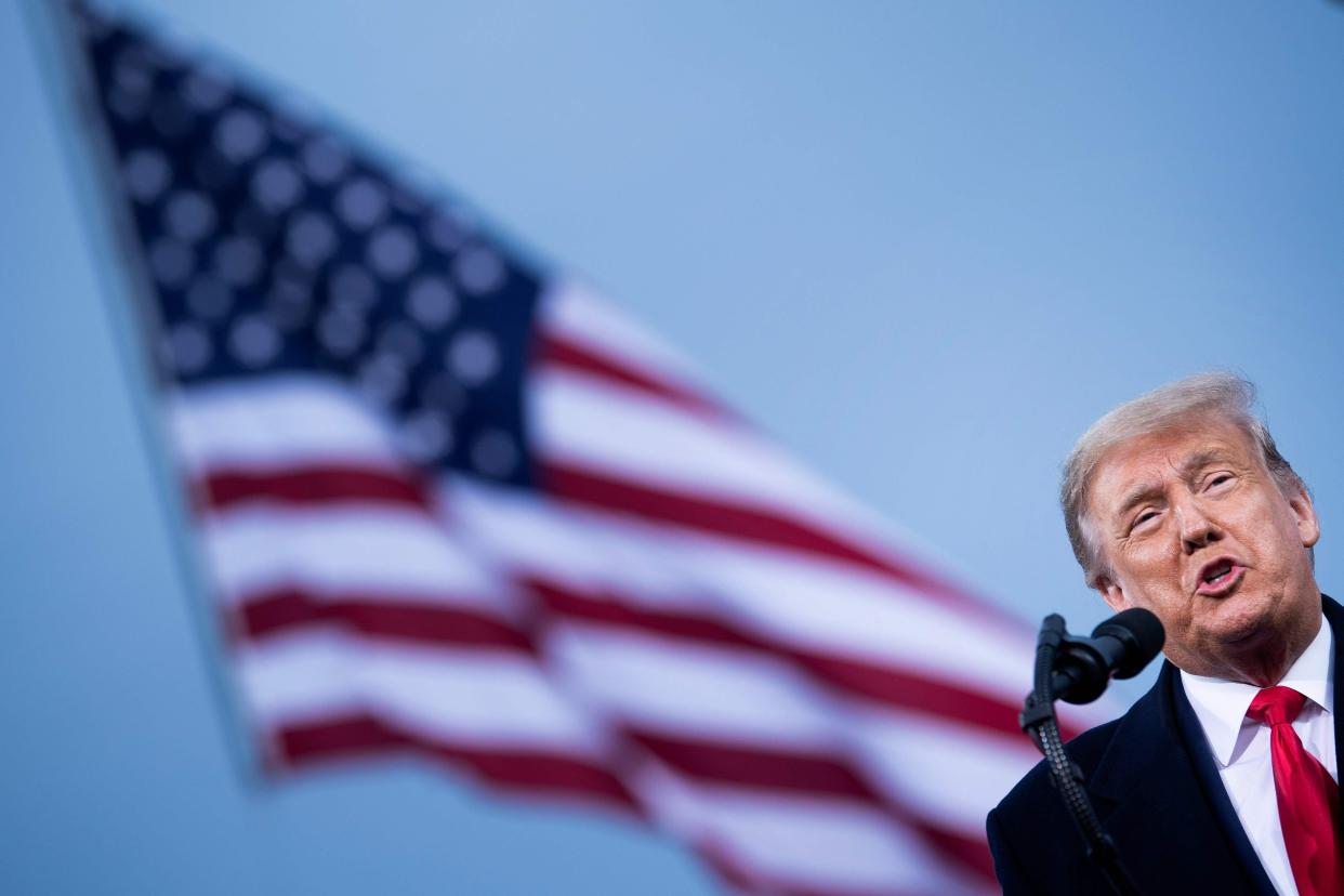 Woman suspected of sending packages to Donald Trump arrested  (AFP via Getty Images)