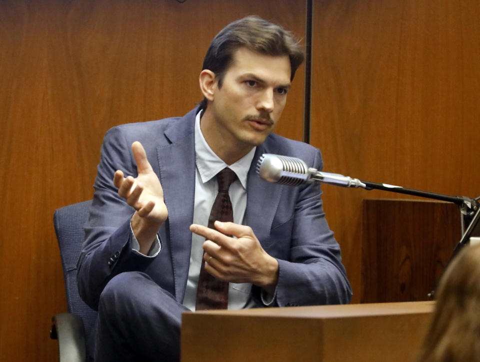FILE - In this May 29, 2019 file photo, actor Ashton Kutcher testifies in the murder trial of Michael Gargiulo in Los Angeles Superior Court. A prosecutor says four strikingly similar attacks on women in California were all planned and executed by a skilled serial killer who studied the lives and homes of victims who lived near him before savagely stabbing them, in his closing remarks to the jury Tuesday, Aug. 6, 2019. Kutcher, who was supposed to have drinks with fashion-design student Ashley Ellerin on the night she was stabbed to death at her Hollywood home in 2001, testified that he arrived very late, looked through Ellerin's window and saw stains that he assumed were spilled wine, and left because he thought she had gone out without him. (Genaro Molina/Los Angeles Times via AP, Pool, File)