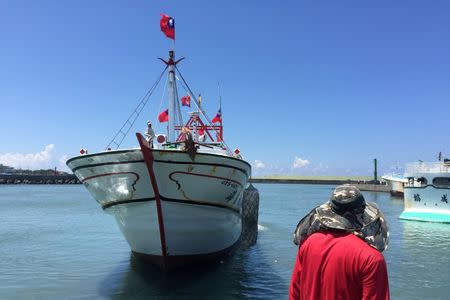 A Taiwanese fishing boat set sail to Itu Aba, which Taiwan calls Taiping, Taiwan's sole holding in the disputed Spratly Islands, in protest against a tribunal's ruling on the South China Sea, in Pingtung, Taiwan July 20, 2016. REUTERS/Damon Lin