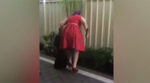 The snake catcher said she stayed in her heels as she didn't have to traipse through bush to get to the reptile. Source: Perth Hills Reptile Removal