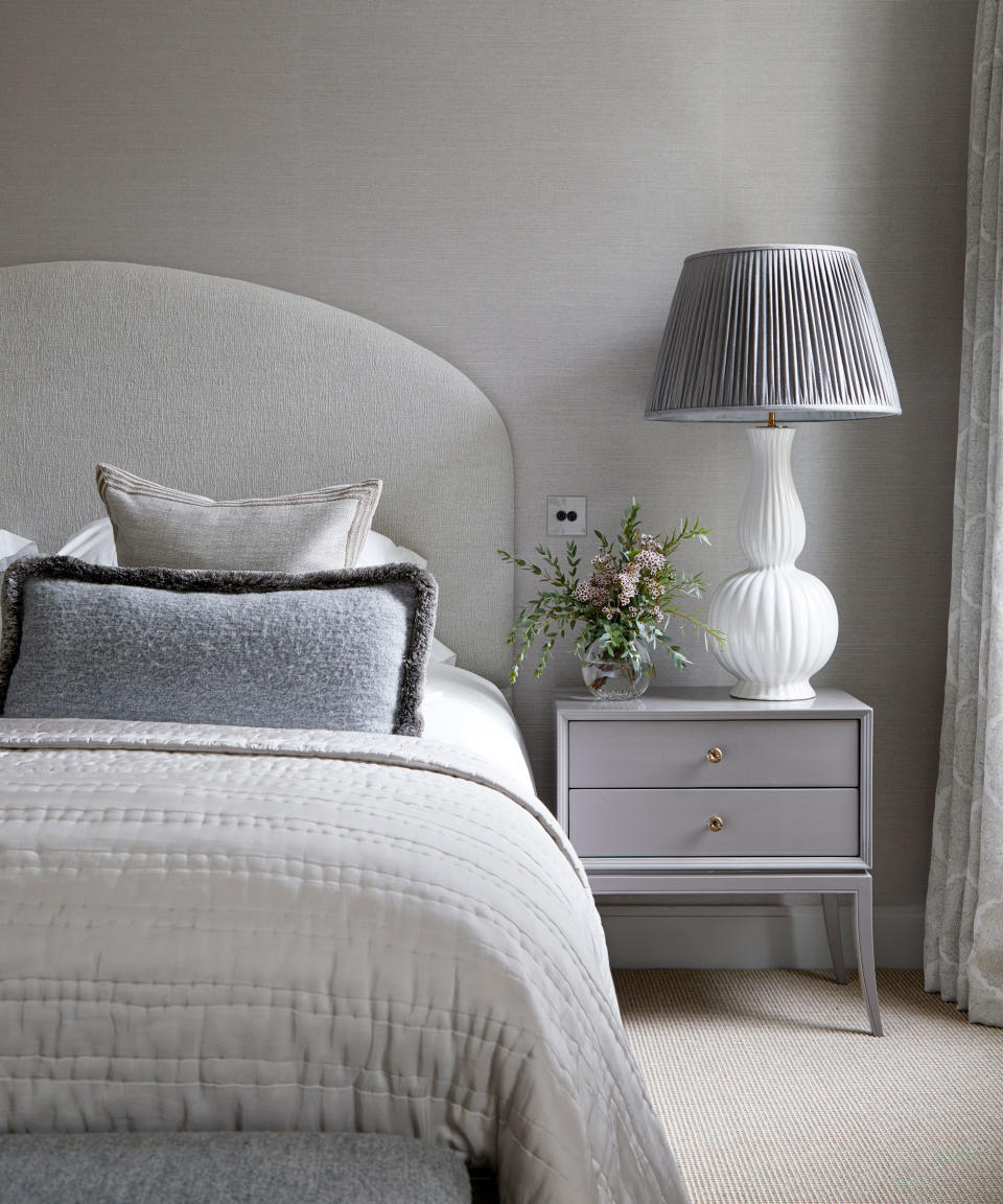 Gray bedroom in elegant period London townhouse