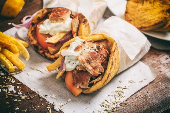 Grilled meat wrapped in pitta bread is a classic Greek dish (Getty/iStock)