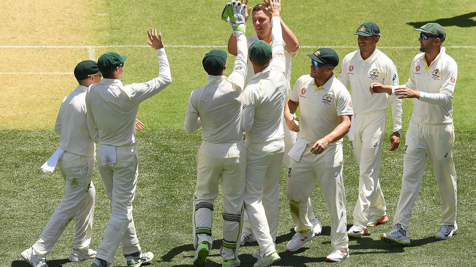 Josh Hazlewood and the Aussies celebrate. (Photo by Quinn Rooney/Getty Images)