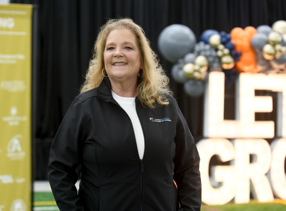 Molly Romig serves as the director of membership at the Canton Regional Chamber of Commerce. She is shown at the chamber's annual meeting at the Center for Performance on the Hall of Fame Village campus.