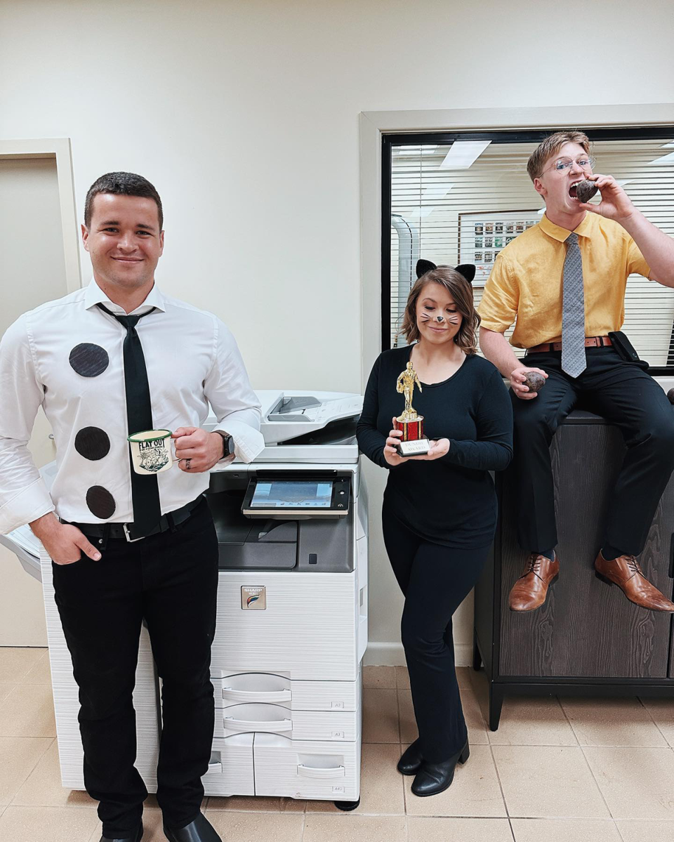 Chandler Powell, Bindi and Robert Irwin dressed as characters from The Office.