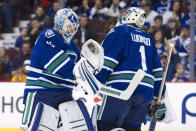 VANCOUVER, CANADA - MARCH 3: Goalie Roberto Luongo #1 of the Vancouver Canucks is replaced by Cory Schneider #35 during the first period in NHL action against the Buffalo Sabres on March 03, 2012 at Rogers Arena in Vancouver, BC, Canada. (Photo by Rich Lam/Getty Images)