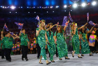 <p>The Cook Islands, way out in the South Pacific near New Zealand, chose not to opt for a conservative look. In tropical floral prints in green, the women finished off with flower crowns. Festival dress made almost chic again.</p><p><i>(Photo: Reuters)</i><br></p>