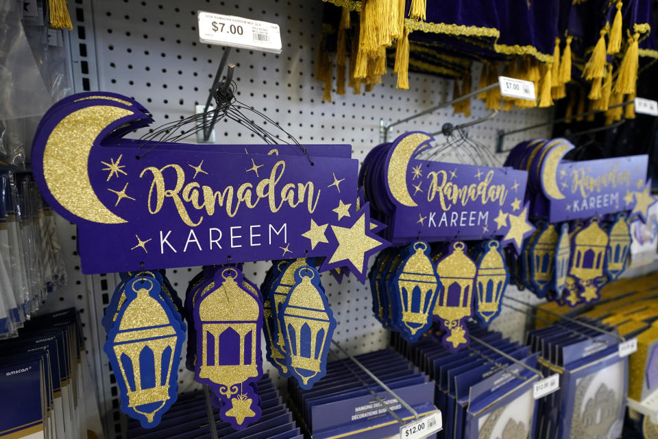 Ramadan decorations are displayed at a Party City store in Dearborn, Mich., on Thursday, March 23, 2023. More businesses are selling Ramadan and Eid items, including DIY kits, lanterns and napkin holders. It's one of the latest signs of big U.S. retailers catering to American Muslim shoppers. Many Muslim Americans enthusiastically welcomed the recognition, applauding those retailers that are making it easier for them to bring their families the cheer that ubiquitously and publicly marks some other faiths' holidays. (AP Photo/Carlos Osorio)