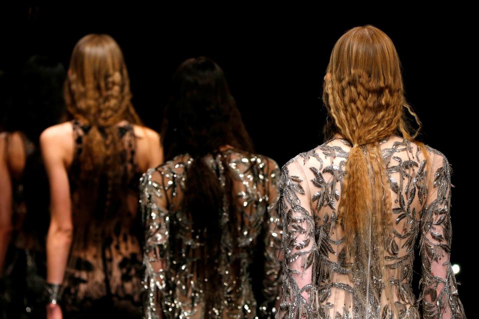 From ethereal white lashes to graphic sci-fi visors, a look back at the romantic beauty ideas on Sarah Burton's Alexander McQueen runway.
