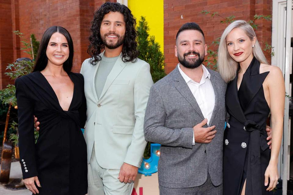 <p>Jason Kempin/Getty Images</p> NASHVILLE, TENNESSEE - AUGUST 25: (L-R) Abby Smyers, Dan Smyers, Shay Mooney, and Hannah Mooney attend the 14th Annual Academy Of Country Music Honors at Ryman Auditorium on Aug. 25, 2021 in Nashville, Tennessee