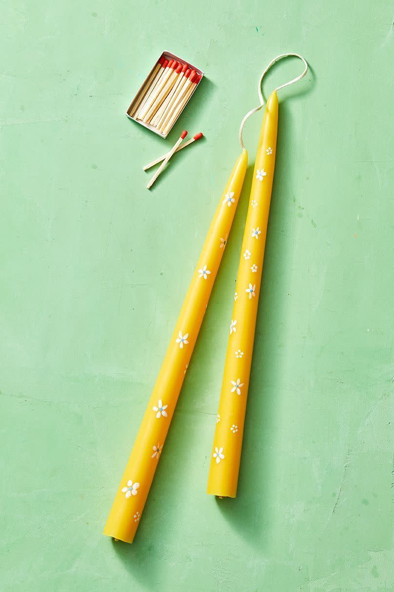 crafts for kids yellow taper candles with white floral designs