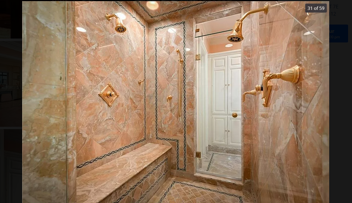 The shower in the main bathroom of 433 Ward Parkway Unit 7E. This Kansas City penthouse overlooking the Plaza is listed for $4.4 million. Screenshot from Zillow. March 7, 2024.