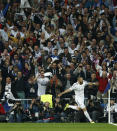 Real's Karim Benzema celebrates after scoring his side's first goal during a first leg semifinal Champions League soccer match between Real Madrid and Bayern Munich at the Santiago Bernabeu stadium in Madrid, Spain, Wednesday, April 23, 2014. (AP Photo/Andres Kudacki)