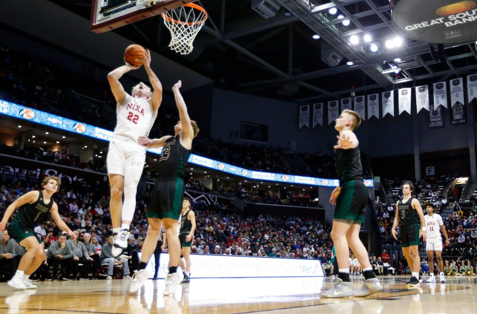 The Springfield Catholic Fightin' Irish took on the Nixa Eagles in the second round of the Bass Pro Shops Tournament of Champions at JQH Arena on Friday, Jan. 14, 2022, 