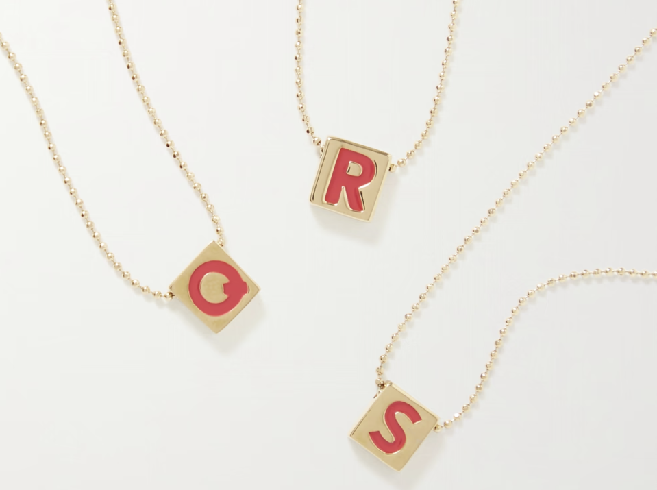 Roxanne Assoulin Initial This gold-plated and enamel necklace. (PHOTO: Net-A-Porter)