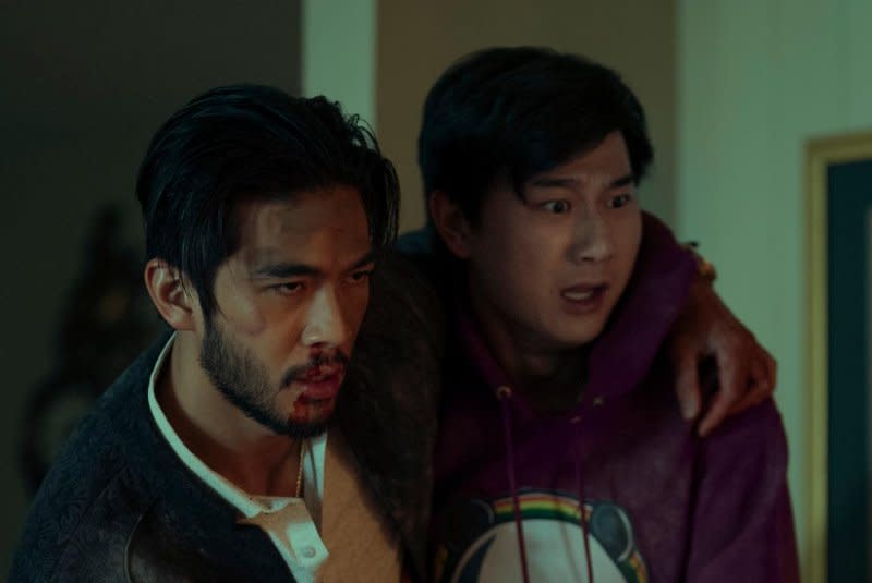 Charlie Sun (Justin Chien, L) protects his brother, Bruce (Sam Song Li). Photo courtesy of Netflix